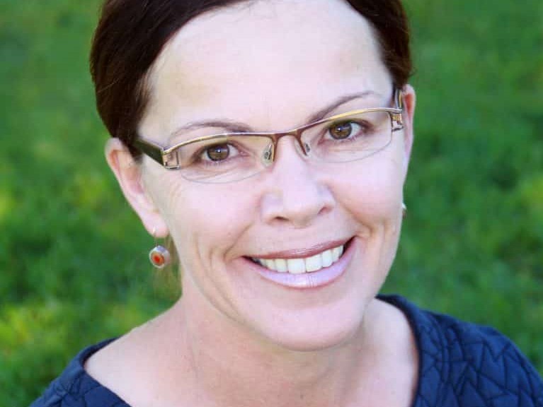 Portrait of Nicky McLeod smiling outdoors